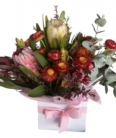 Wild Thing - Banksia, protea, native flowers are arranged .